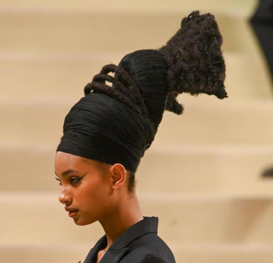 Exploring Ancestral Roots Through Hairstyle: The Artistic Legacy of the Mangbetu in Modern Expressions